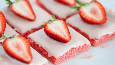 A plate of delicious strawberry brownies, topped with fresh strawberries. A plate of delicious strawberry brownies, topped with fresh strawberries.