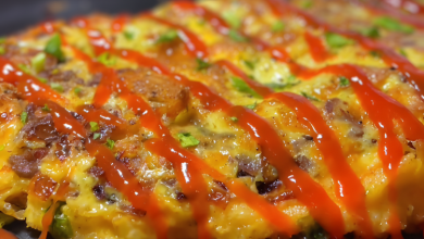 A perfectly cooked omelette filled with beef mince, cheddar, and herbs. A perfectly cooked omelette filled with beef mince, cheddar, and herbs.