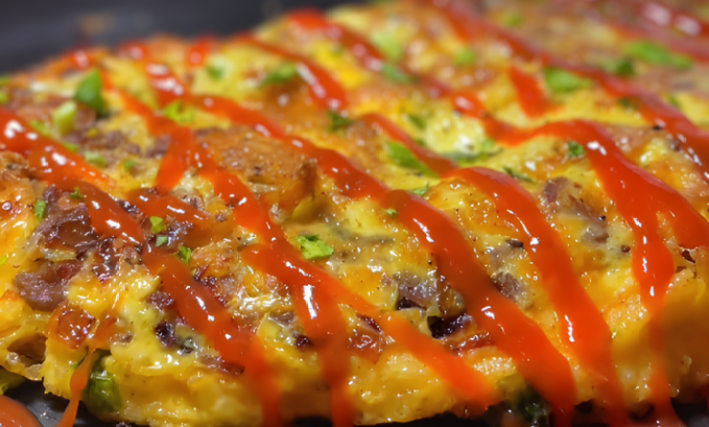 A perfectly cooked omelette filled with beef mince, cheddar, and herbs. A perfectly cooked omelette filled with beef mince, cheddar, and herbs.