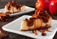 A delicious slice of Pecan Pie Cheesecake with a golden crust, creamy filling, and pecan topping. A delicious slice of Pecan Pie Cheesecake with a golden crust, creamy filling, and pecan topping.