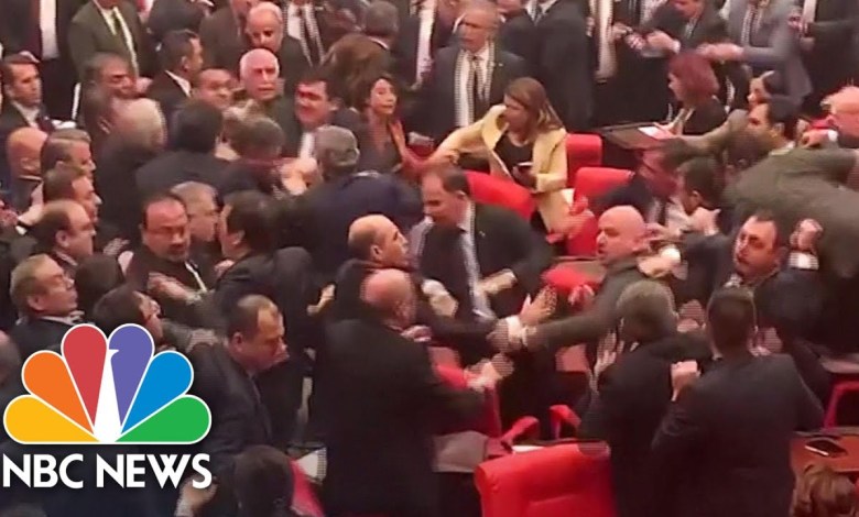 Fists Fly As Lawmakers Brawl In Turkish Parliament | NBC News Fists Fly As Lawmakers Brawl In Turkish Parliament | NBC News