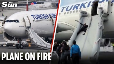 Moment passengers evacuate on emergency slide as plane catches fire after landing Moment passengers evacuate on emergency slide as plane catches fire after landing