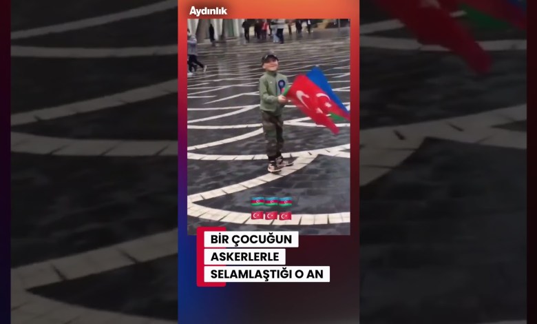 A child carrying Turkish and Azerbaijani flags greets soldiers #explore #turkish #flag A child carrying Turkish and Azerbaijani flags greets soldiers #explore #turkish #flag