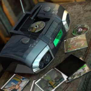 CD Player, CD Case, and CD CD Player, CD Case, and CD