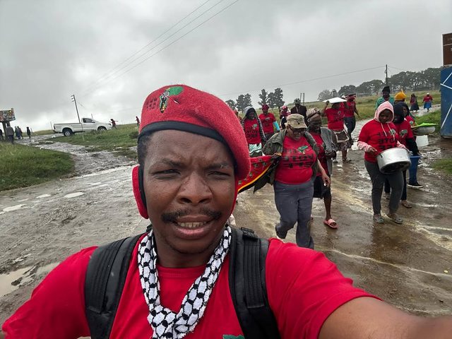 Mayibuye Melisizwe Mandela in EFF supporter clothing. Mayibuye Melisizwe Mandela in EFF supporter clothing.