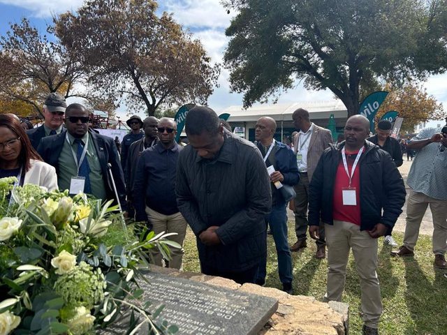 Deputy President of South Africa Paul Mashatile bent over by the Wall of Remembrance at the NAPO Farmers' Expo in Bothaville. Deputy President of South Africa Paul Mashatile bent over by the Wall of Remembrance at the NAPO Farmers' Expo in Bothaville.