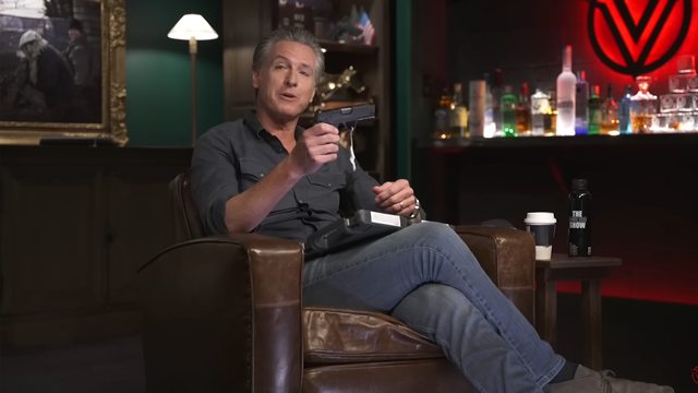 Gavin Newsom awkwardly accepts a Sig Sauer P365 X-Macro from Shawn Ryan on *The Shawn Ryan Show*, July 17, 2025, only to face a legal tangle with his own California gun laws. Gavin Newsom awkwardly accepts a Sig Sauer P365 X-Macro from Shawn Ryan on *The Shawn Ryan Show*, July 17, 2025, only to face a legal tangle with his own California gun laws.