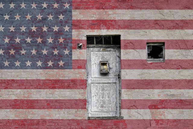 US flag painted on wall. Photo by Angela Yuriko Smith. US flag painted on wall. Photo by Angela Yuriko Smith.