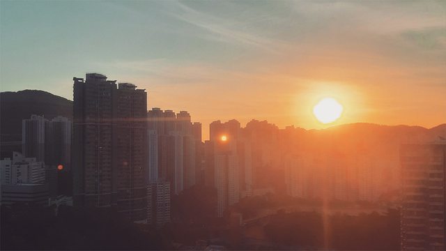 Hong Kong skyline at dusk, symbolizing the city’s fading autonomy as the U.S. confronts its extraterritorial crackdown on activists. Hong Kong skyline at dusk, symbolizing the city’s fading autonomy as the U.S. confronts its extraterritorial crackdown on activists.