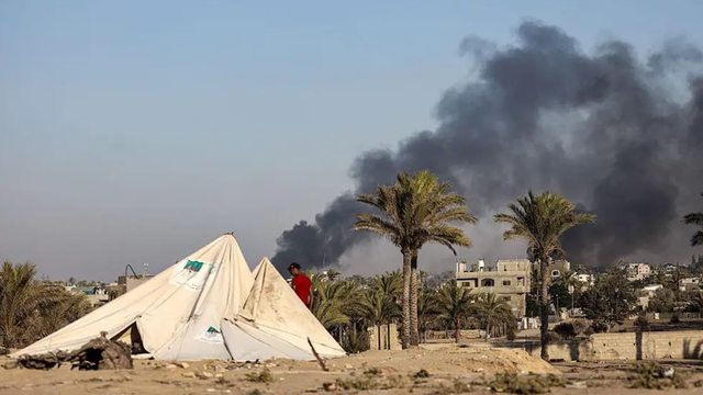 Smoke billows over western Deir al-Balah amid Israeli military operations on Monday. Smoke billows over western Deir al-Balah amid Israeli military operations on Monday.
