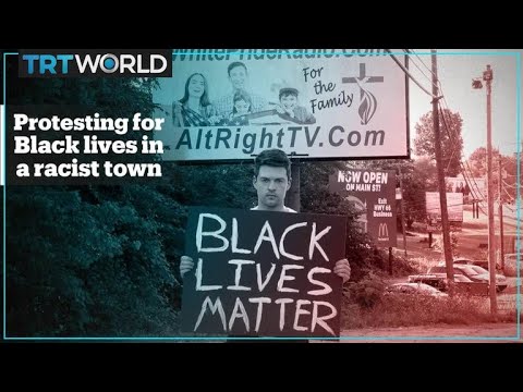 White man holds Black Lives Matter sign in America’s most racist town White man holds Black Lives Matter sign in America’s most racist town
