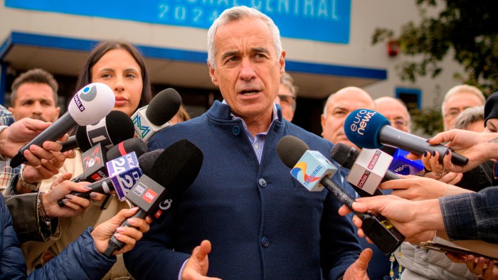 Pro-Russia hard-right candidate tops Romanian presidential poll Pro-Russia hard-right candidate tops Romanian presidential poll