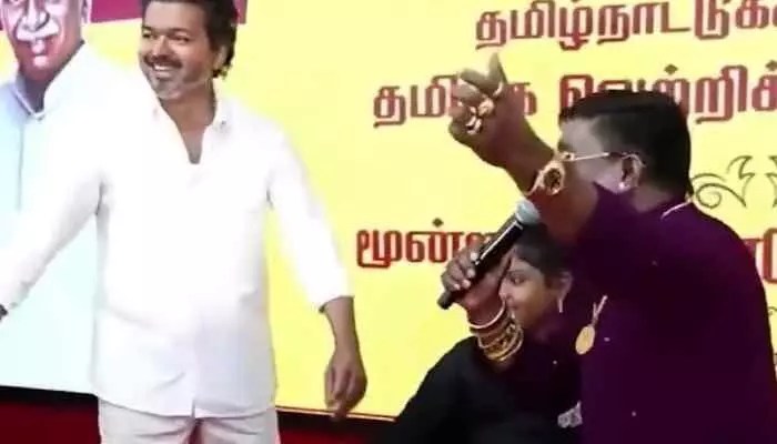 Vijay's Viral Dance Steps with Child Amidst TN Political Campaign Vijay's Viral Dance Steps with Child Amidst TN Political Campaign