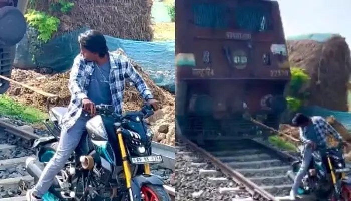 రైలును లాగబోయి అడ్డంగా బుక్కైన యువకుడు! సోషల్ మీడియాలో ట్రోలింగ్స్ షురూ!! రైలును లాగబోయి అడ్డంగా బుక్కైన యువకుడు! సోషల్ మీడియాలో ట్రోలింగ్స్ షురూ!!
