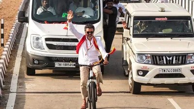 Vijay's Rally Reaction Sparks Meme Frenzy! Fans Defend Star After Petal Incident Vijay's Rally Reaction Sparks Meme Frenzy! Fans Defend Star After Petal Incident