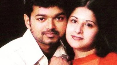 Vijay's Touching Moment: Reacts to Fan's Pic with Estranged Wife Amid Election Campaign Vijay's Touching Moment: Reacts to Fan's Pic with Estranged Wife Amid Election Campaign