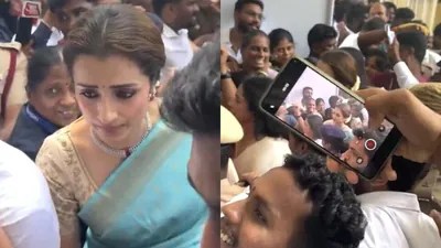 Trisha Krishnan Mobbed at CM Vijay's Oath Ceremony: A Star's Chaotic Exit Trisha Krishnan Mobbed at CM Vijay's Oath Ceremony: A Star's Chaotic Exit