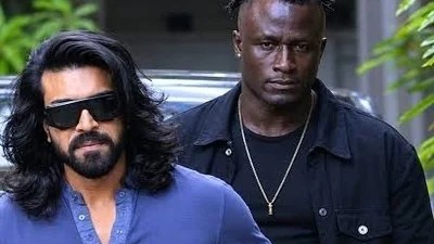 Ram Charan's MMA Fighter Bodyguard Goes Viral: Actor Reacts to Kevin Kunta's Fame Ram Charan's MMA Fighter Bodyguard Goes Viral: Actor Reacts to Kevin Kunta's Fame