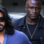 Ram Charan's MMA Fighter Bodyguard Goes Viral: Actor Reacts to Kevin Kunta's Fame Ram Charan's MMA Fighter Bodyguard Goes Viral: Actor Reacts to Kevin Kunta's Fame