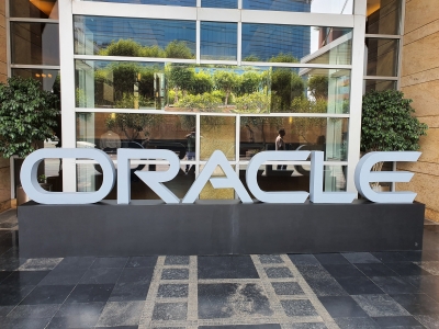 Oracle office building with employees during global layoffs announcement Oracle office building with employees during global layoffs announcement