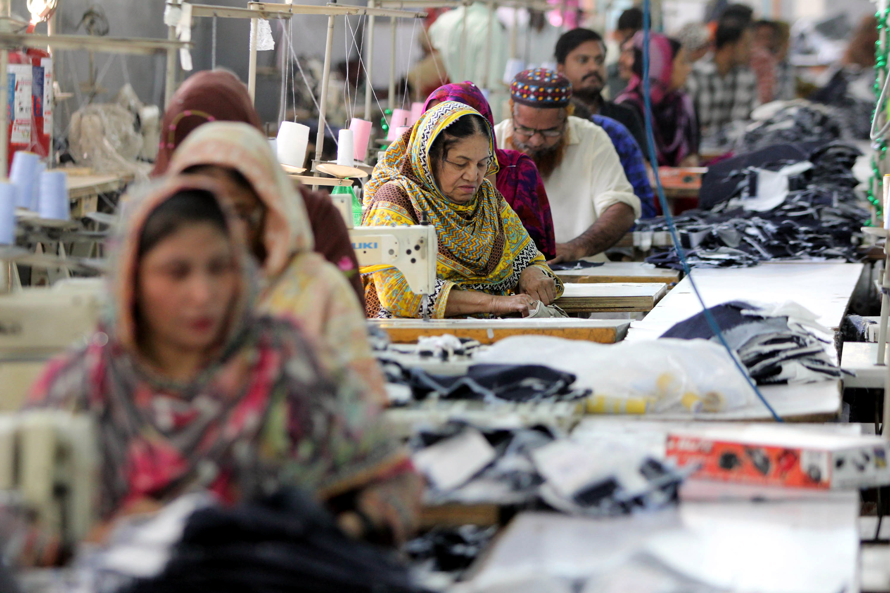 Pakistan garment factory workers and EU trade discussion Pakistan garment factory workers and EU trade discussion