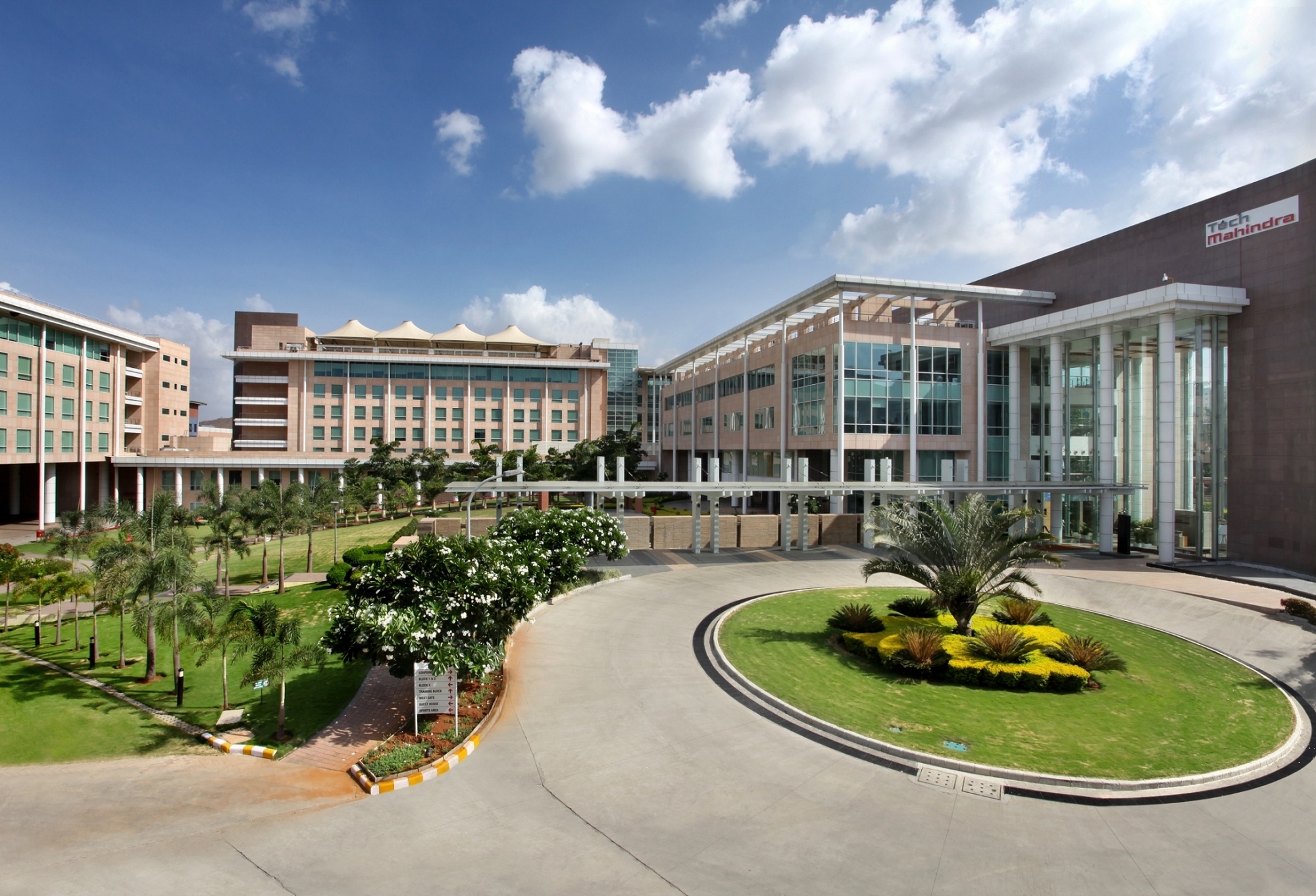 Tech Mahindra office building exterior with company logo Tech Mahindra office building exterior with company logo