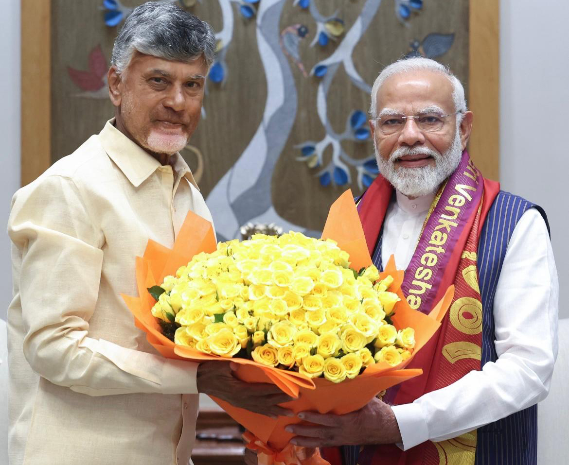 PM Modi meeting with Chandrababu Naidu at a political event PM Modi meeting with Chandrababu Naidu at a political event