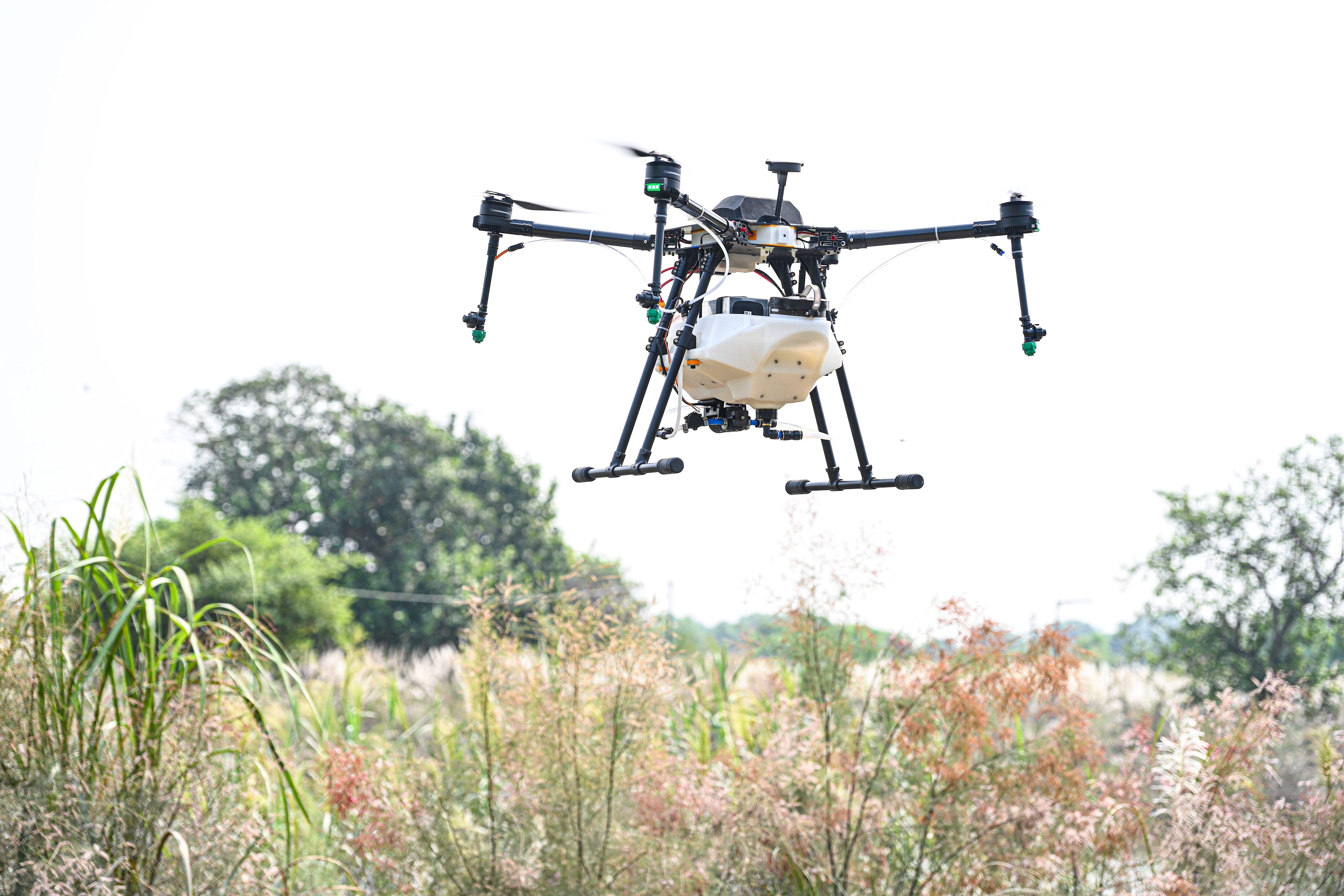 Agricultural drone spraying crops in Indian field commercial drone market Agricultural drone spraying crops in Indian field commercial drone market