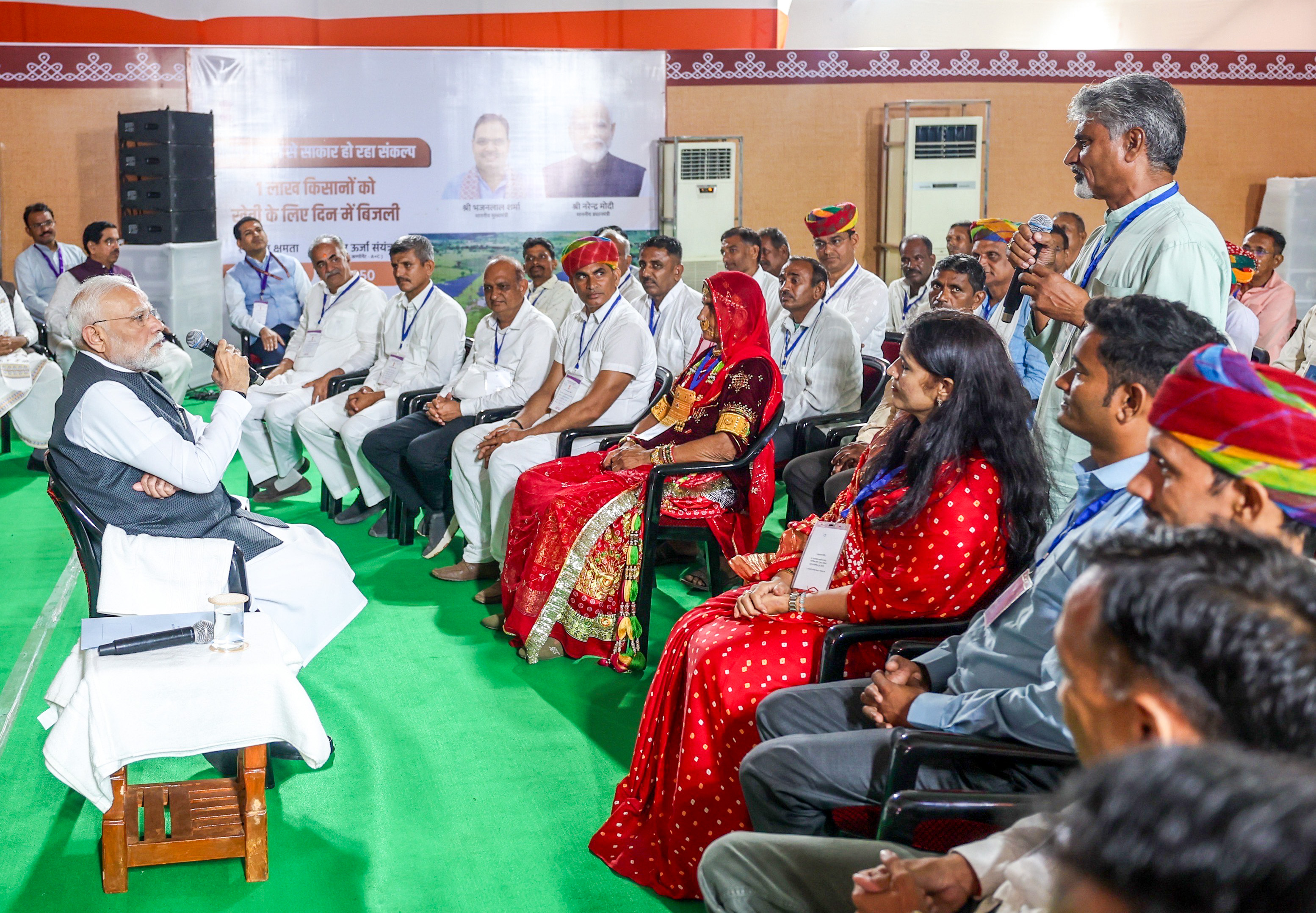 PM-KISAN scheme disbursement event with farmers receiving financial assistance PM-KISAN scheme disbursement event with farmers receiving financial assistance