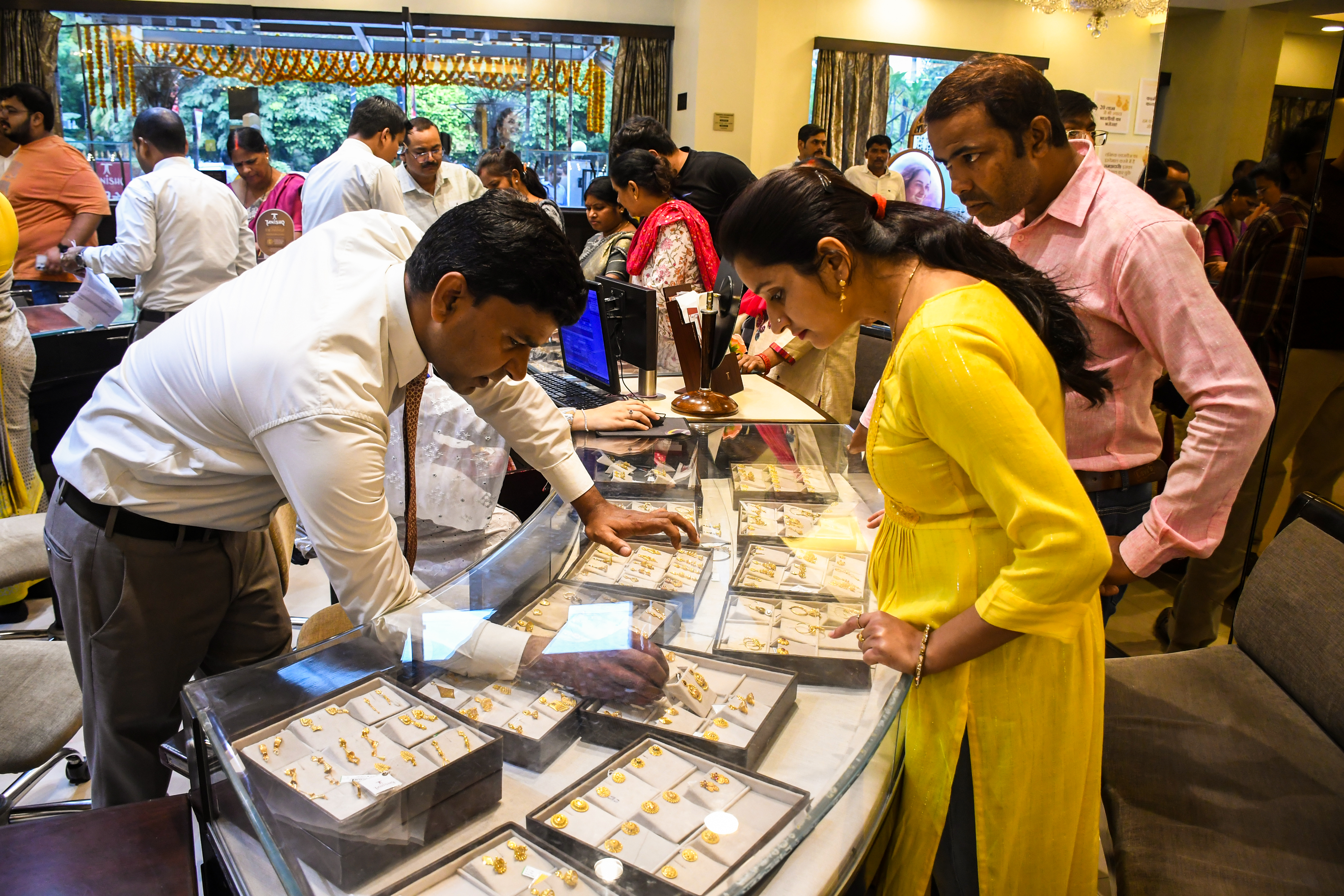 Akshaya Tritiya gold and silver jewellery display with traditional motifs Akshaya Tritiya gold and silver jewellery display with traditional motifs