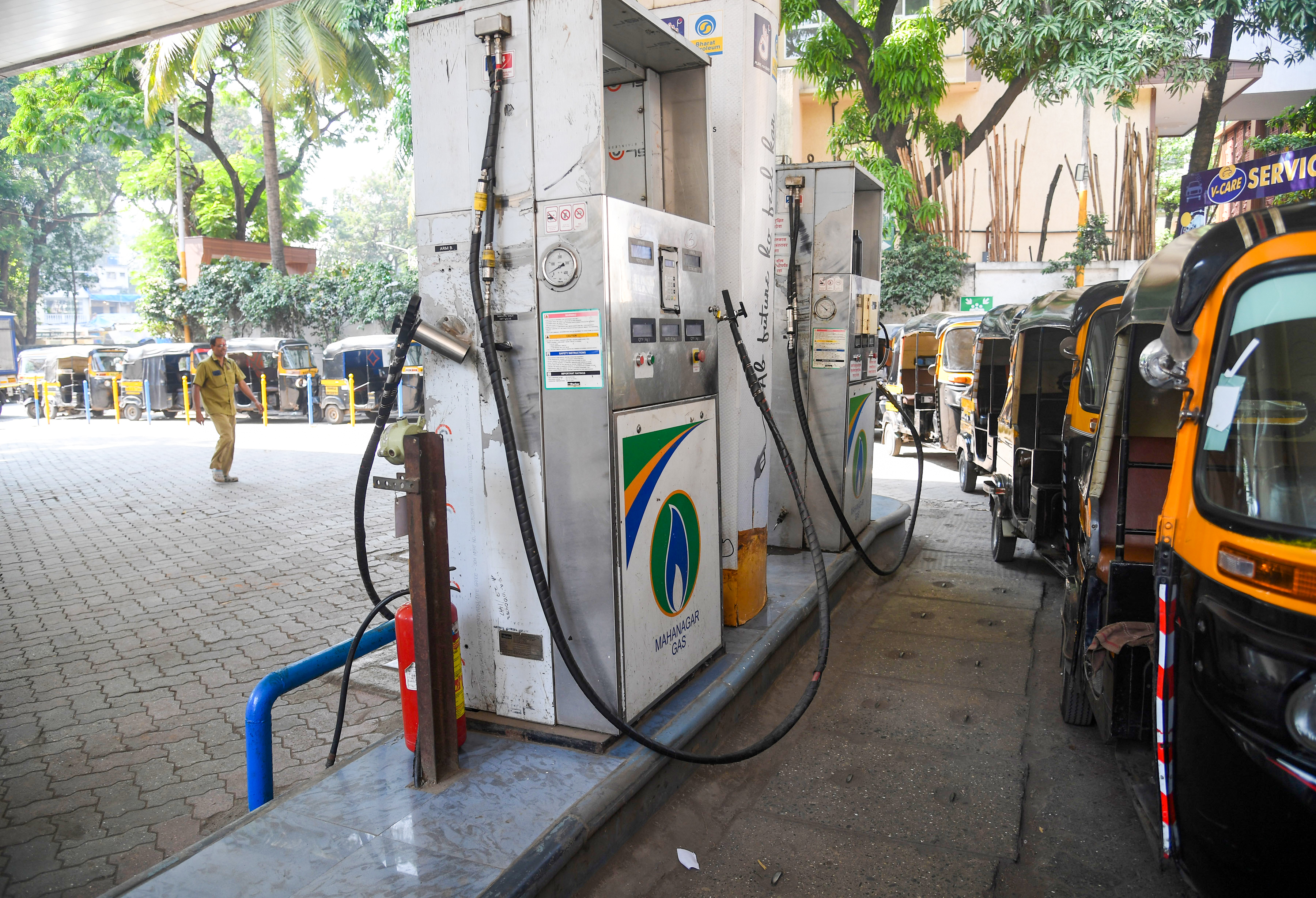 CNG price hike at Mumbai fuel station with MGL signage CNG price hike at Mumbai fuel station with MGL signage