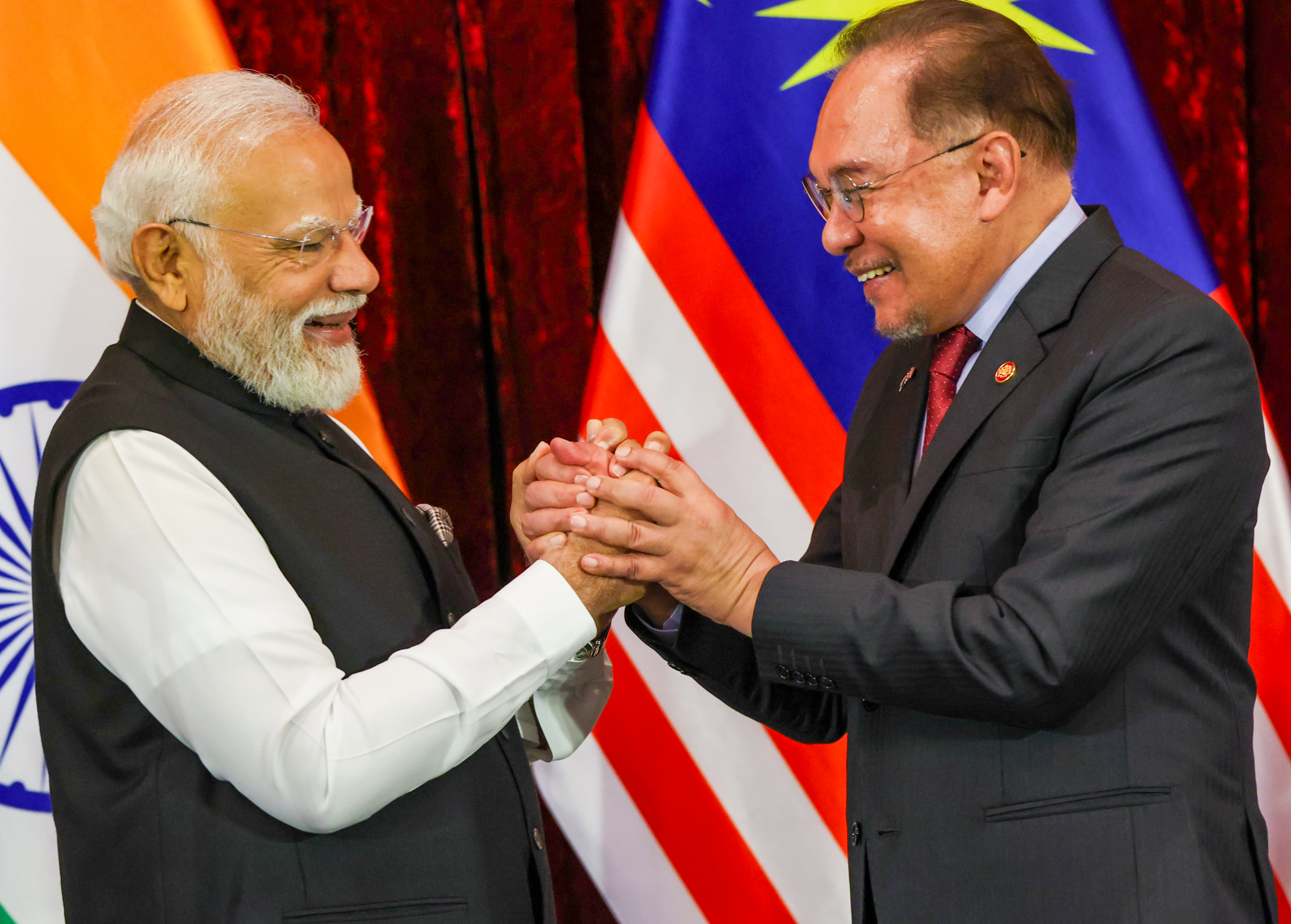 India's longest-serving Prime Minister Narendra Modi with Malaysian Prime Minister Ibrahim India's longest-serving Prime Minister Narendra Modi with Malaysian Prime Minister Ibrahim