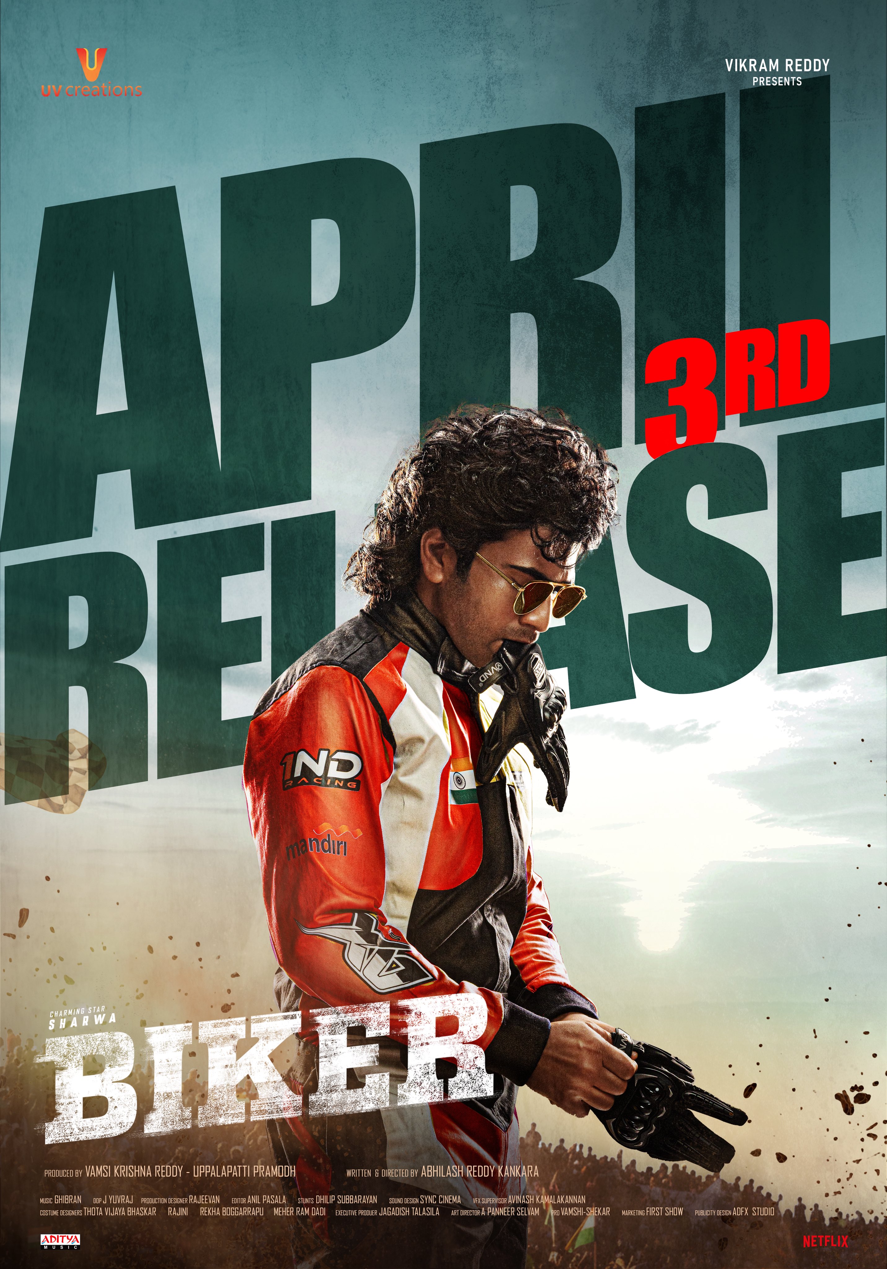 Sharwanand Biker movie poster featuring motorcycle action scene Sharwanand Biker movie poster featuring motorcycle action scene