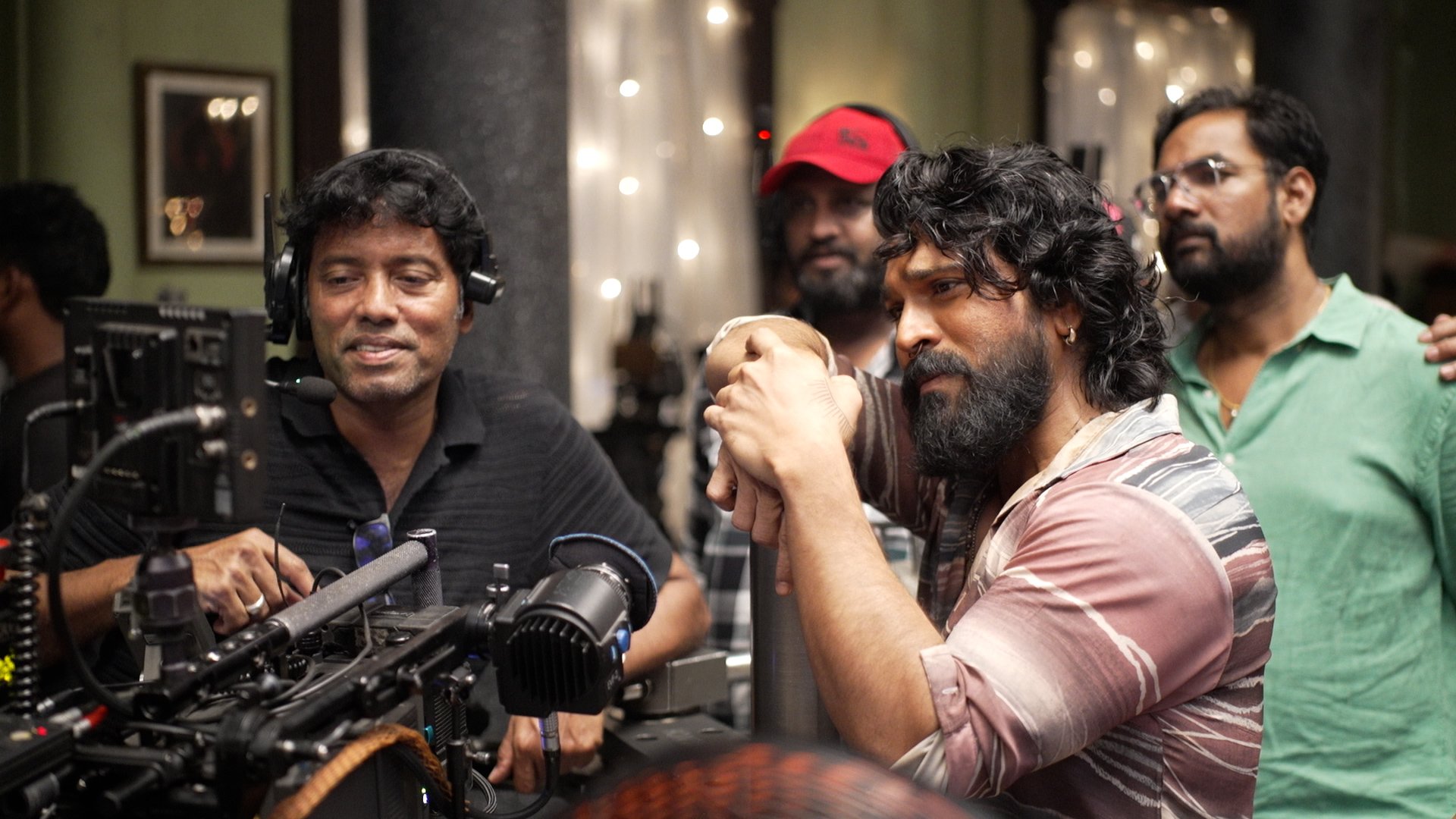 Ram Charan and cinematographer Rathnavelu on the set of Peddi film Ram Charan and cinematographer Rathnavelu on the set of Peddi film