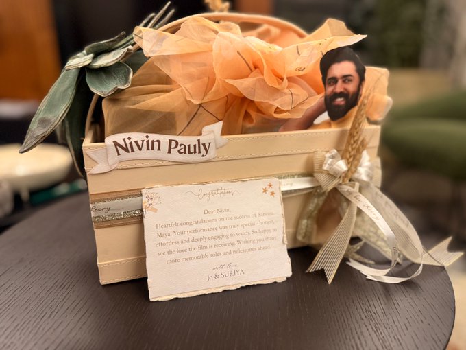 Nivin Pauly Suriya Jyothika gift hamper and note Nivin Pauly Suriya Jyothika gift hamper and note
