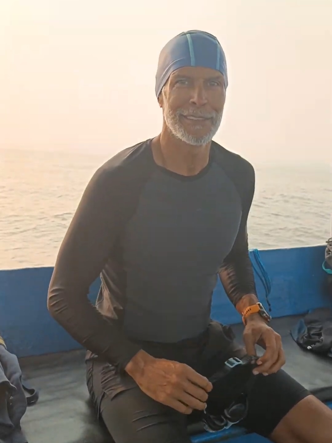 Milind Soman swimming in Goa during Holi celebration Milind Soman swimming in Goa during Holi celebration