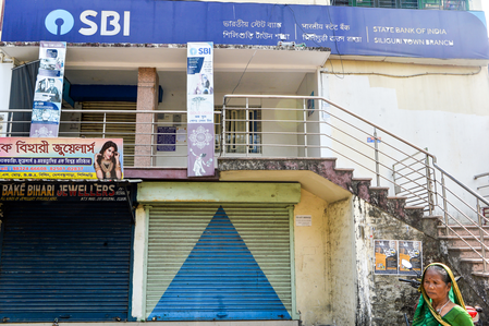 SBI Chairman C.S. Setty announcing women empowerment loan on International Women's Day SBI Chairman C.S. Setty announcing women empowerment loan on International Women's Day