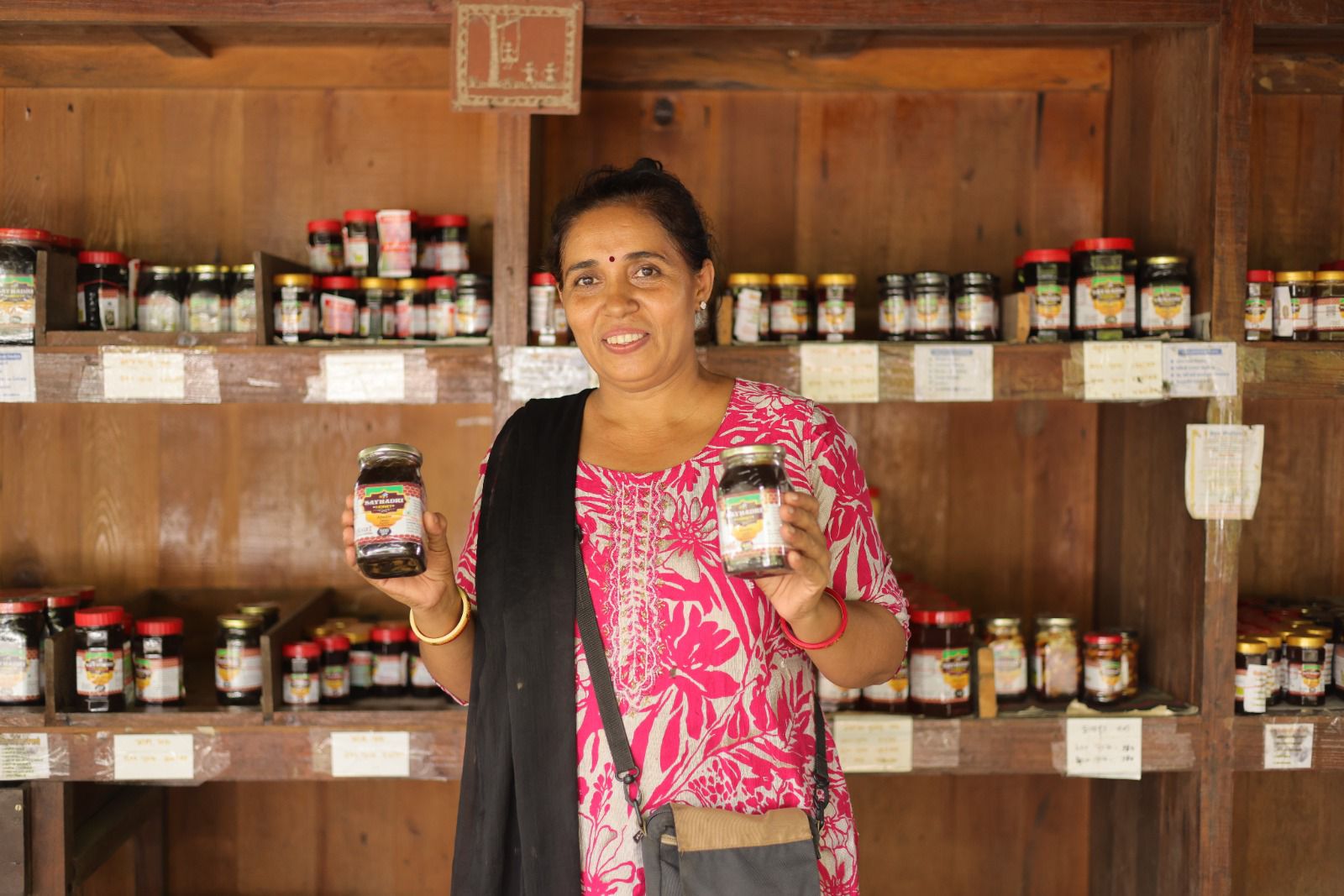 Gujarat woman entrepreneur showcasing rural women empowerment products Gujarat woman entrepreneur showcasing rural women empowerment products