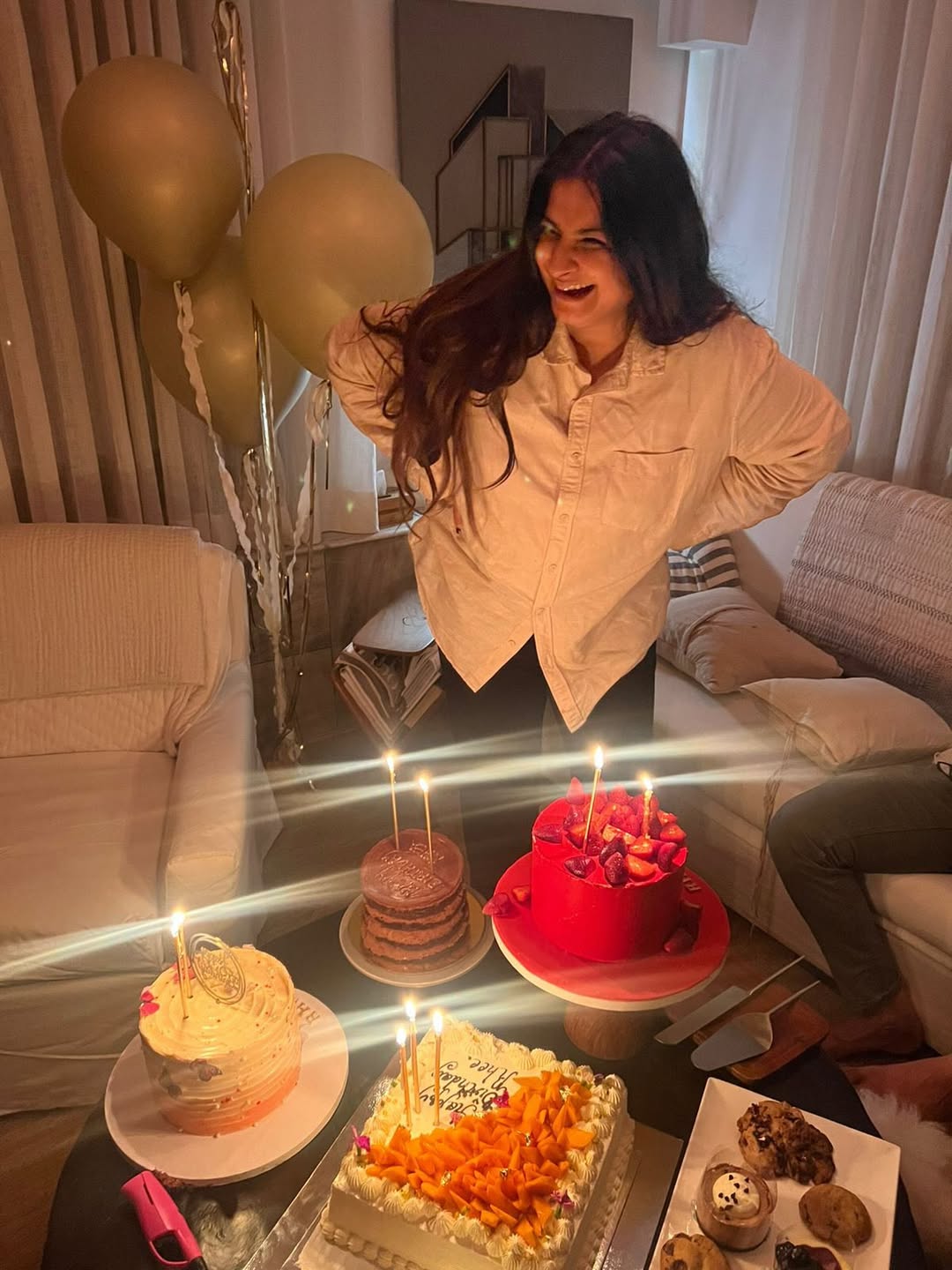 Rhea Kapoor cutting birthday cake with family including nephew Vayu Rhea Kapoor cutting birthday cake with family including nephew Vayu
