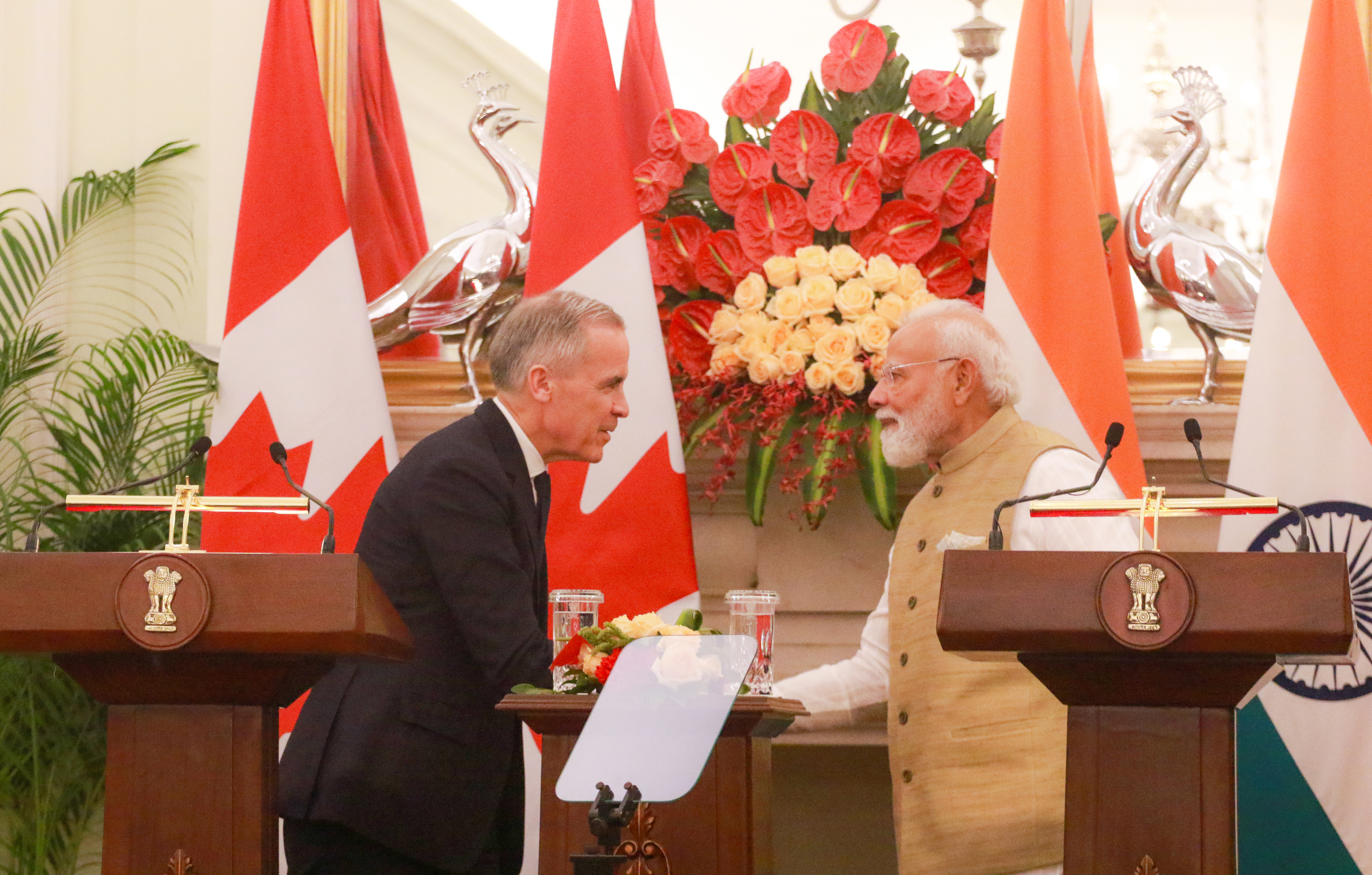 India and Canada clean energy partnership meeting officials shaking hands India and Canada clean energy partnership meeting officials shaking hands