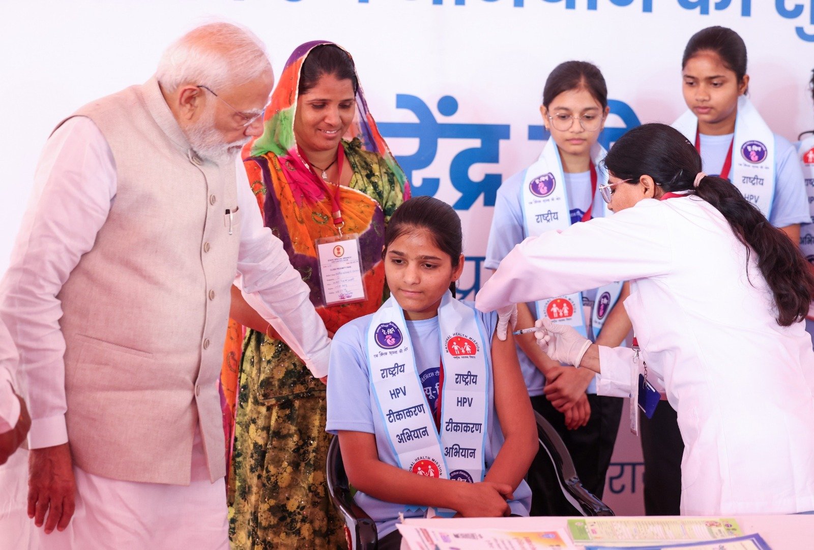 Ajmer schoolgirls receiving HPV vaccine and interacting with PM Modi Ajmer schoolgirls receiving HPV vaccine and interacting with PM Modi