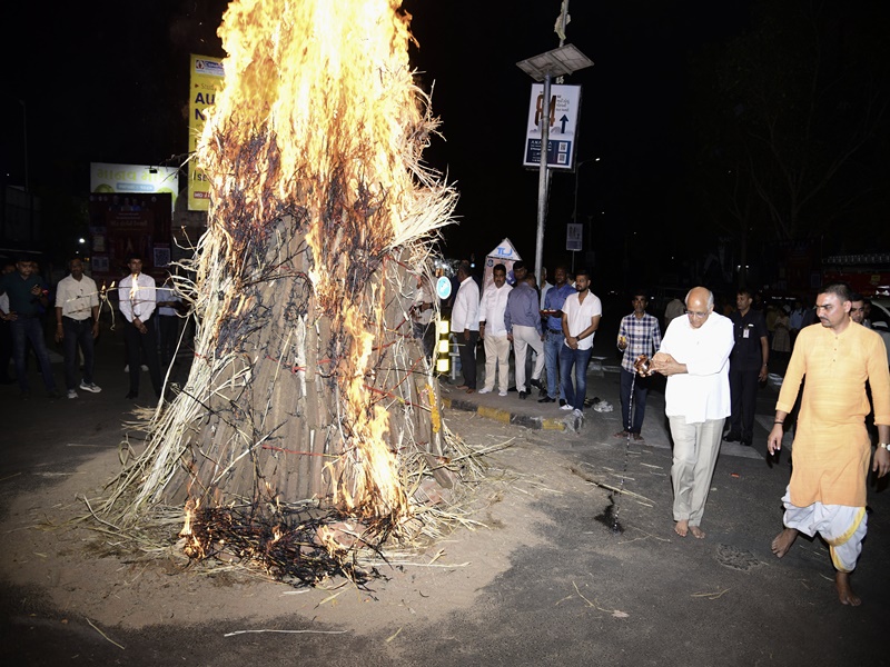 Gujarat Chief Minister at Vedic Holi celebration in Ahmedabad performing rituals around ceremonial fire Gujarat Chief Minister at Vedic Holi celebration in Ahmedabad performing rituals around ceremonial fire
