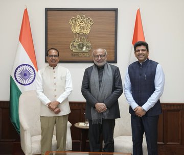Vice President Radhakrishnan and Minister Shivraj Singh Chouhan discussing rural development schemes Vice President Radhakrishnan and Minister Shivraj Singh Chouhan discussing rural development schemes