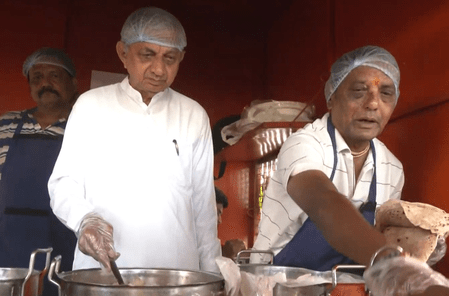 Gujarat minister serving food at Shramik Annapurna Yojana centre Gujarat minister serving food at Shramik Annapurna Yojana centre