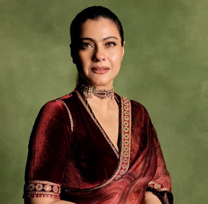 Kajol posing by a door in a social media post about random moments Kajol posing by a door in a social media post about random moments