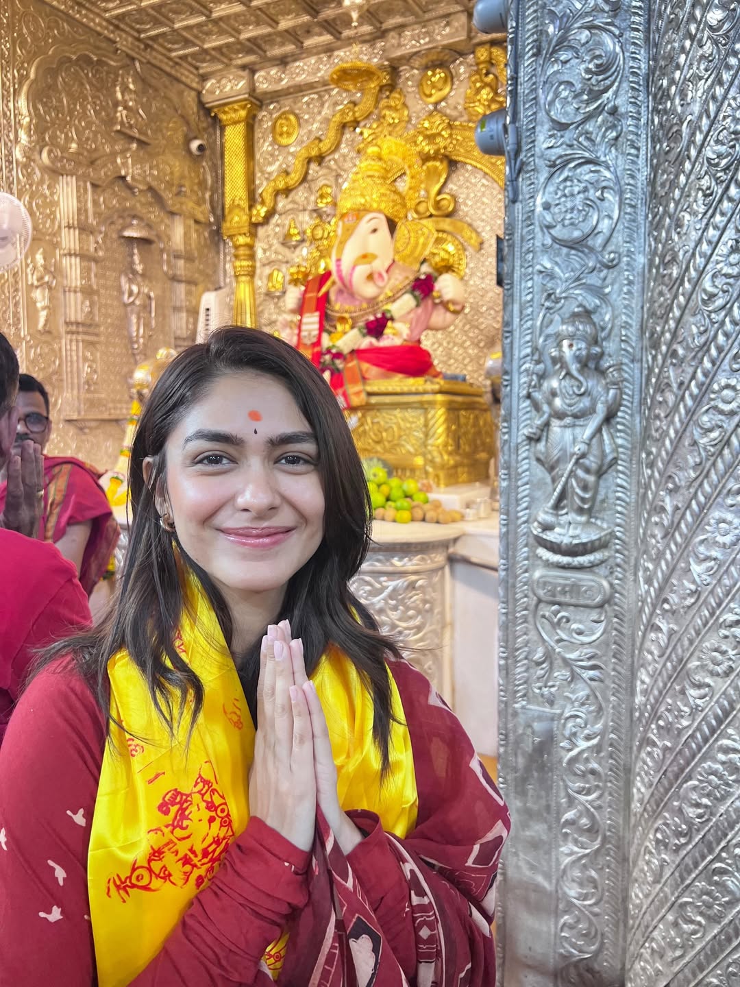 Mrunal Thakur in red ethnic attire during Pune visit for Bappa blessings Mrunal Thakur in red ethnic attire during Pune visit for Bappa blessings