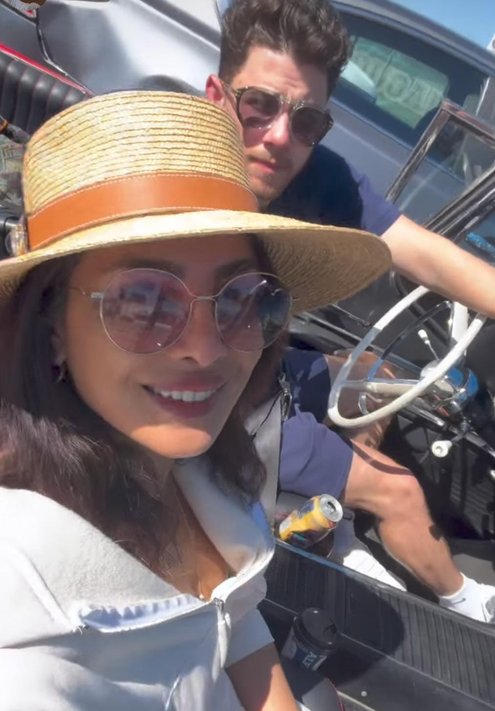 Priyanka Chopra and Nick Jonas smiling in a car during mommy daddy day Priyanka Chopra and Nick Jonas smiling in a car during mommy daddy day