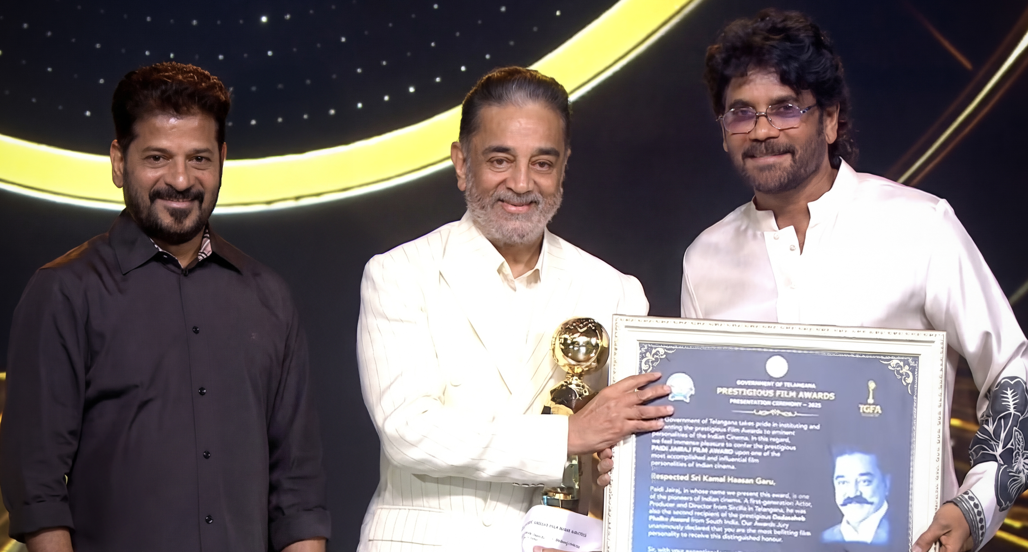 Kamal Haasan receiving award from Revanth Reddy and Nagarjuna at Telangana Gaddar Film Awards Kamal Haasan receiving award from Revanth Reddy and Nagarjuna at Telangana Gaddar Film Awards