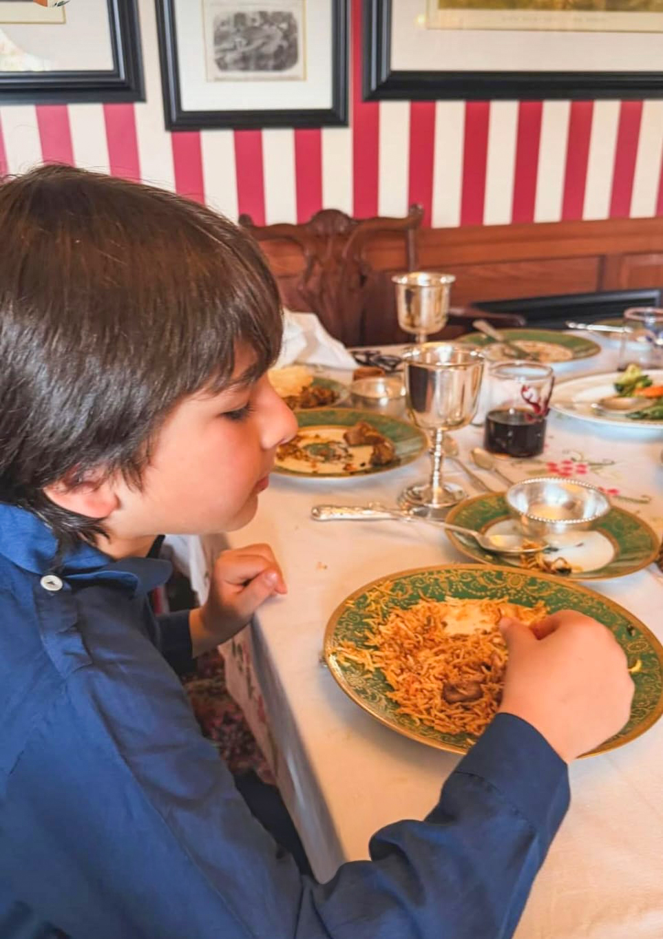 Taimur Ali Khan eating Eid biryani at family celebration Taimur Ali Khan eating Eid biryani at family celebration