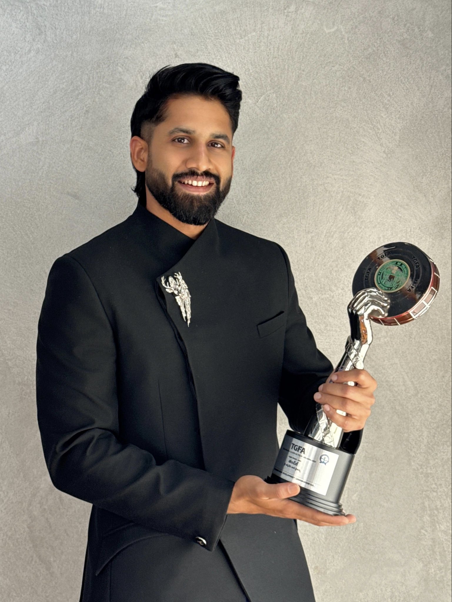 Naga Chaitanya holding Best Actor award for Thandel Naga Chaitanya holding Best Actor award for Thandel